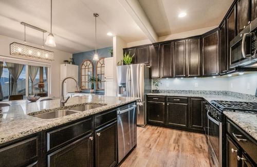 Monument House | Spacious 5 Bedroom Home With Mountain Views, Heated Pool, & Sunroom!