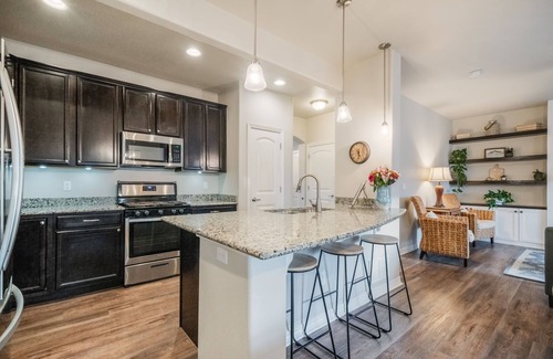 Monument House | Spacious 5 Bedroom Home With Mountain Views, Heated Pool, & Sunroom!