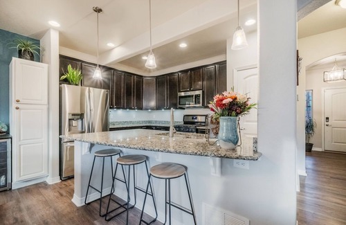 Monument House | Spacious 5 Bedroom Home With Mountain Views, Heated Pool, & Sunroom!