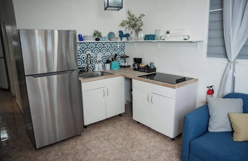 Catano Apartment | Spacious 6-bedroom 4-bath w. 2 King Beds in Vibrant Catano Ferry to Old San Juan