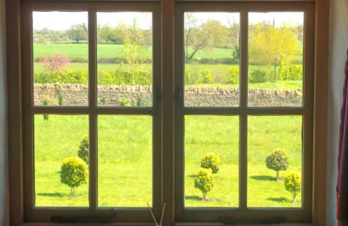 Lullington House | Spacious and beautifully converted 18th century stone barn. Pet-friendly!