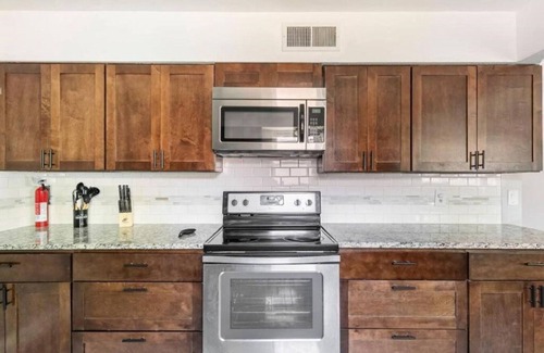 Garland House | Convenient Getaway: Family-Friendly with Pool & Kitchen