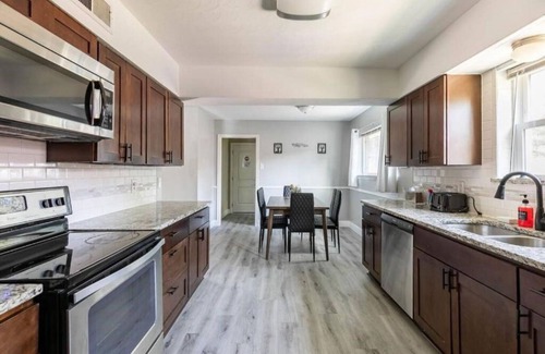 Garland House | Convenient Getaway: Family-Friendly with Pool & Kitchen