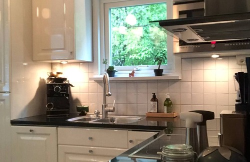 Enskede House | Renovated 1940s House with Pool in Vibrant Cultural Area