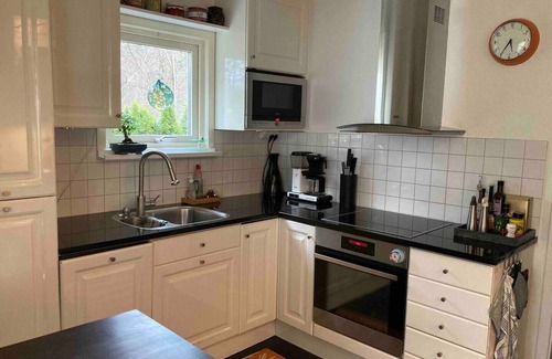 Enskede House | Renovated 1940s House with Pool in Vibrant Cultural Area