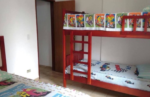 Tupi Apartment | Guest Rated: 9.6 Oceanfront Apartment in Praia Grande