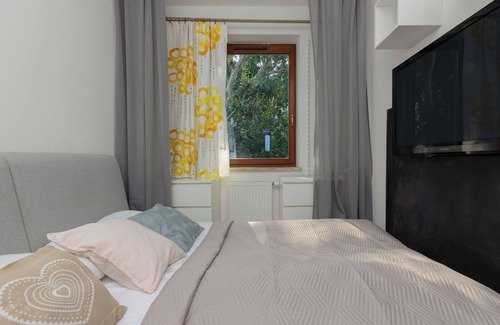 Bielany Apartment | Spacious Apartment with Parking and Family-Friendly Amenities