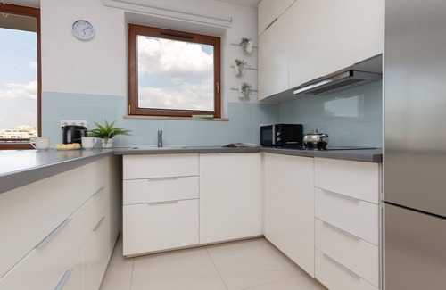 Bielany Apartment | Spacious Apartment with Parking and Family-Friendly Amenities