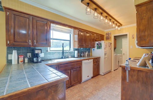 Fort Smith House | Inviting Arkansas Retreat with Balcony & Fire Pit Amenities