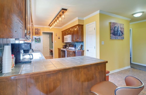 Fort Smith House | Inviting Arkansas Retreat with Balcony & Fire Pit Amenities