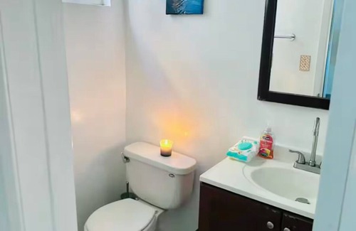 Seaside Apartment | Inviting Bedroom with Private Bathroom for Families & Pets
