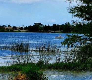 Lake Underhill House | Inviting Bedroom with Private Workspace and Ensuite Bathroom
