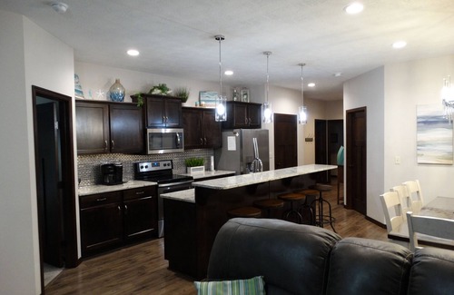 Arnolds Park Cabin | Idyllic Bridges Bay Poolside Cabin with Ocean View Amenities