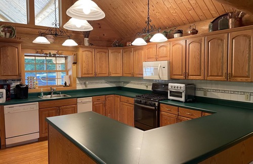 Sullivan House | Idyllic Cabin Retreat by Tranquil Pond with Private Dock