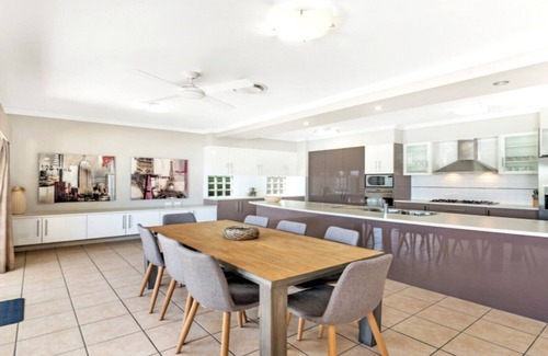Banksia Beach House | Elegant Canal Home with Private Pool and Pontoon Access