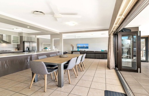 Banksia Beach House | Elegant Canal Home with Private Pool and Pontoon Access