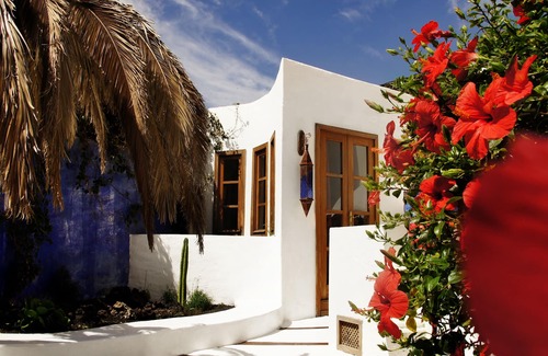 Uga House | Historic FINCA: Private Garden Vacation Apartment Awaits