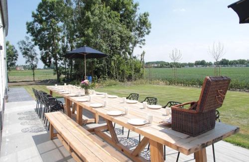 Zuidzande House | Charming Zuidzande Farmhouse with Private Garden & Pool