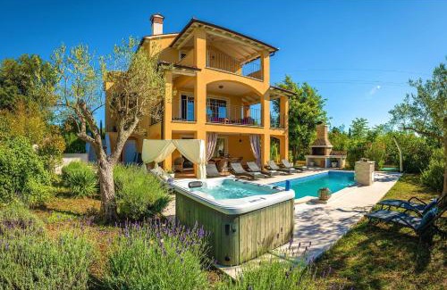 Rakalj House | Inviting Holiday House with Pool, Spa & Playground