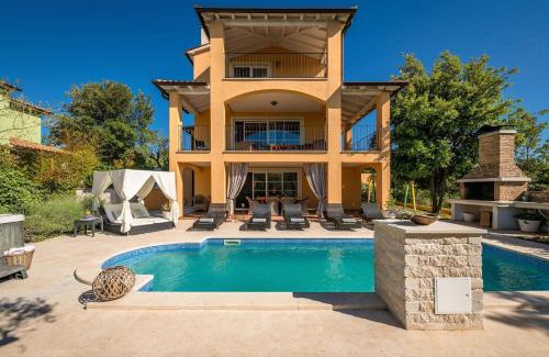 Rakalj House | Inviting Holiday House with Pool, Spa & Playground