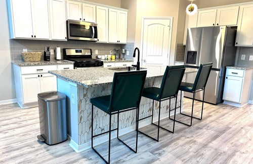 Buda House | Spacious home near Austin with a large backyard perfect for enjoying sunsets.