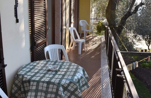 Assenza Apartment | Picturesque Lake View Apartment with Modern Amenities