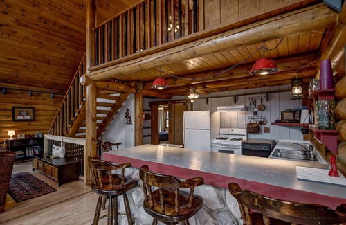 Chetek House | Idyllic Lake Front Authentic Log Home with Pool & Views