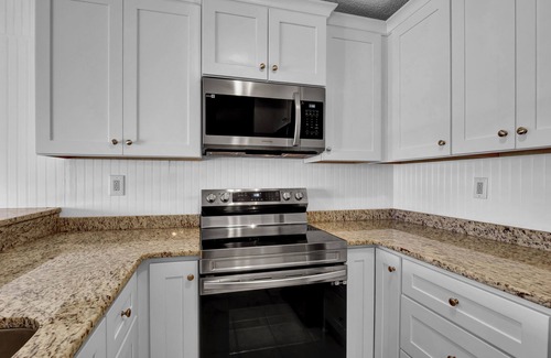 North Topsail Beach Condo | Oceanfront Villa Capriani: Guest Rated 9.8 with Pool & Kitchen