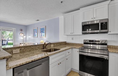 North Topsail Beach Condo | Oceanfront Villa Capriani: Guest Rated 9.8 with Pool & Kitchen