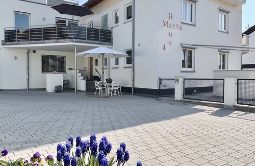 Waggershausen Apartment | Elegant Oceanfront Apartment with Pool & Lake Views
