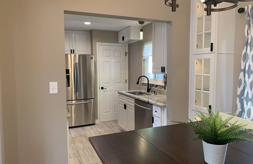 Whitehall House | Modern 4-Bedroom Retreat with Upscale Backyard & Spa