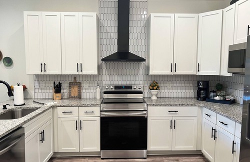 South Pensacola Cottage | Modern Downtown Cottage: Pet-Friendly with Backyard Firepit