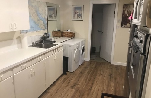 Campbell River House | Stunning One Bedroom Suite with Ocean View & Spa Access