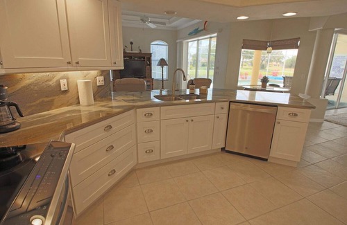 Long Meadow House | Relaxing Pool with Scenic Canal Views and Family-Friendly Amenities