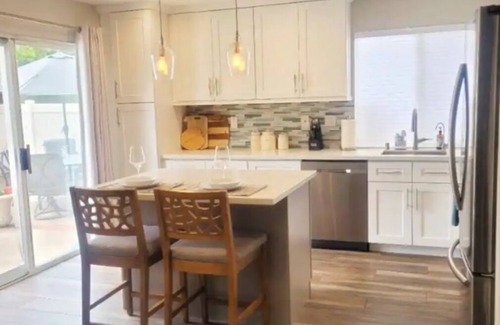 Vista House | Idyllic Poolside Retreat Steps from Beach and Legoland