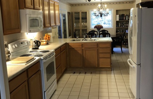 Mayfield House | Idyllic Riverfront Retreat with Spa & Family-Friendly Amenities