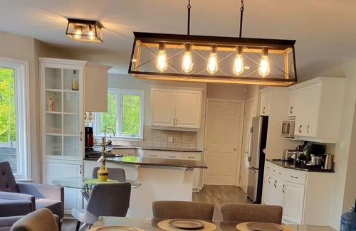 Grand Bend House | Spacious riverfront cottage in Grand Bend, ON, with stunning views and comfort!