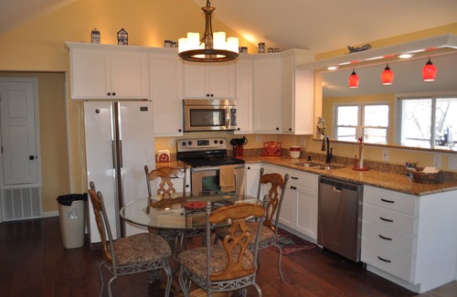 Winfield Cabin | Riverfront Retreat: Pet Friendly with Pool & Breakfast