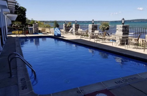 Traverse City Condo | Panoramic Beach Views and Relaxing Amenities Await You