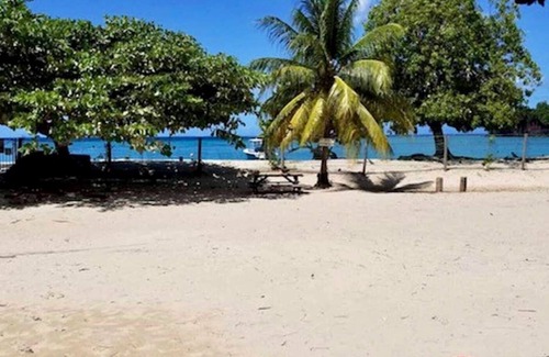 Fort Jeudy House | Secluded Beach Home with Ocean View and Spa Access