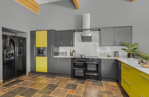 Hethel House | Stylish 4-Bed Home with Patio, Garden & Parking Access