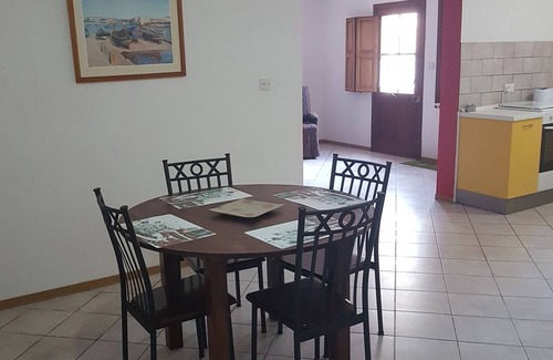 Iklin Apartment | Bright Apartment in Villa with Child-Friendly Amenities