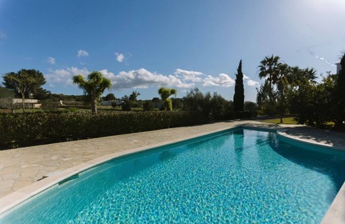 Sant Antoni de Portmany Villa | Idyllic Villa with Pool and Lush Garden, Rated 10/10