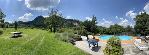 Marzabotto Villa | Experience Luxury at SPArisio: Pool, Tennis & Ocean Views