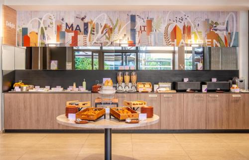 Le Bourg - Gare De Vaise Hotel | Discover Hotel ParkSaône: Pet-Friendly Stay with Breakfast