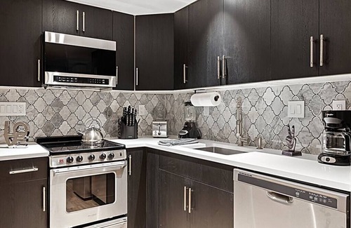 Melrose Condo | Cozy SpeakEasy Suite with Fireplace & Free Parking