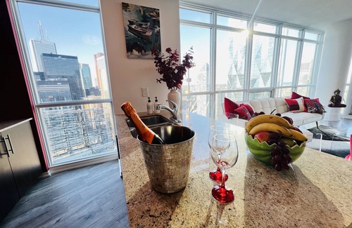 Downtown Toronto Apartment | Elegant 2BD Downtown Toronto Retreat with Parking & Amenities