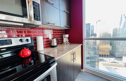 Downtown Toronto Apartment | Elegant 2BD Downtown Toronto Retreat with Parking & Amenities