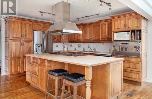 Regional District of Nanaimo House | Inviting Blue Dolphin Walk-on Waterfront with Ocean View