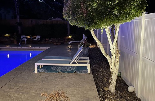 Jones Mills House | Discover a Backyard Oasis with Pool and Ocean Views